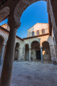 Porec, Parenzo, Euphrasian Basilica, arcades and tower view, unesco world heritage site, Istria, Adriatic coast, Croatia Porec, Parenzo, Euphrasian Basilica, arcades and tower view, unesco world heritage site, Istria, Adriatic coast, Croatia
